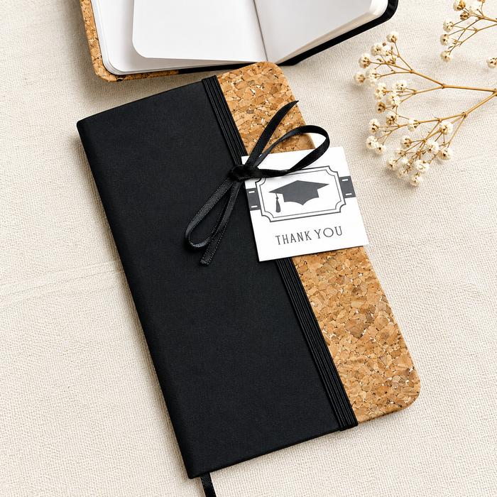 Notebook with a Graduation Tag